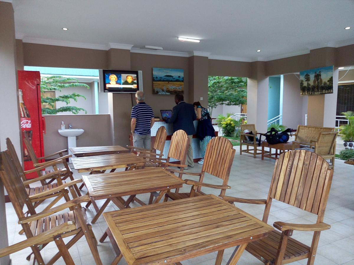 Mara Courtyard Lodge Dar es Salaam Quarto foto