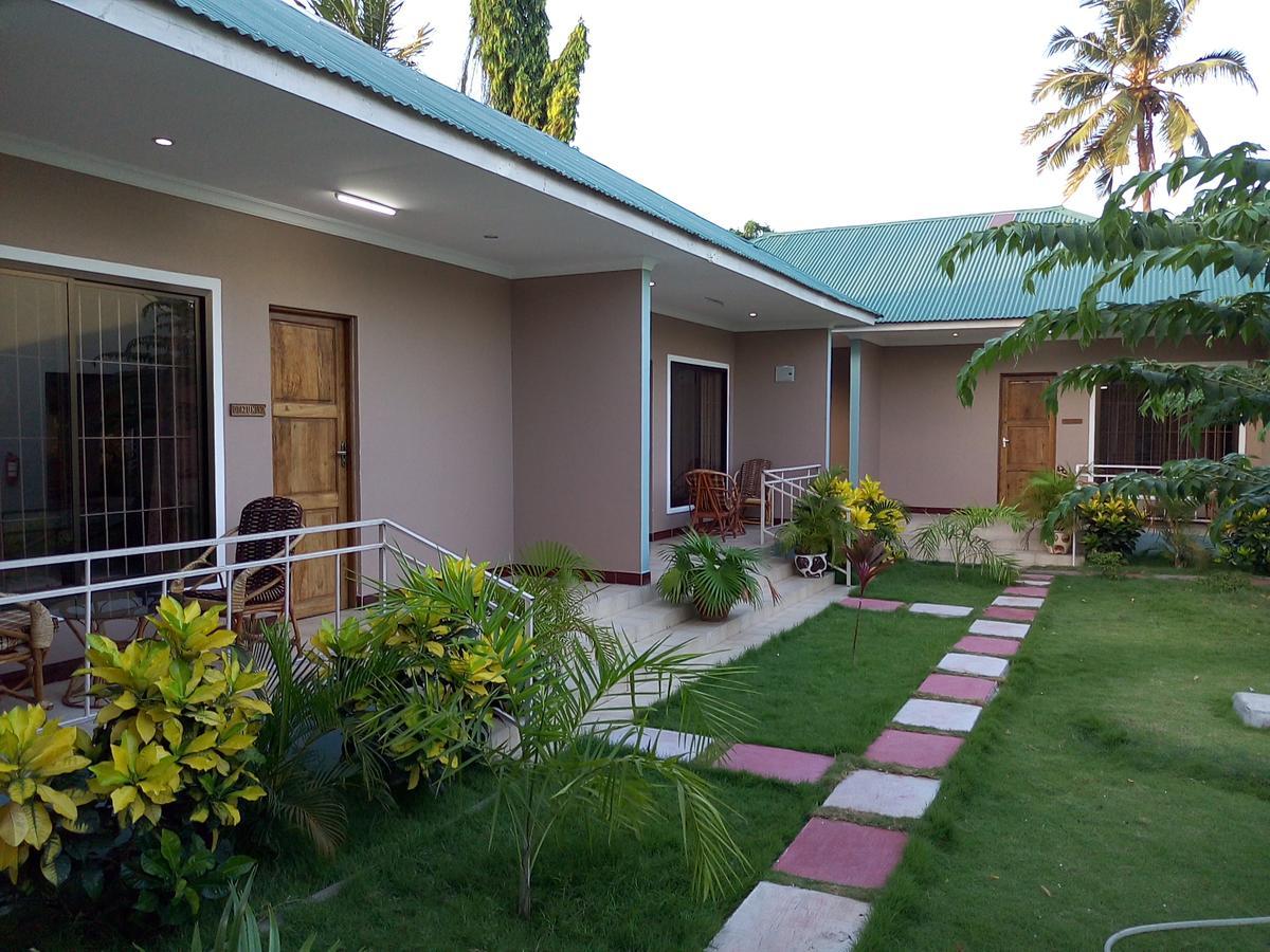 Mara Courtyard Lodge Dar es Salaam Quarto foto